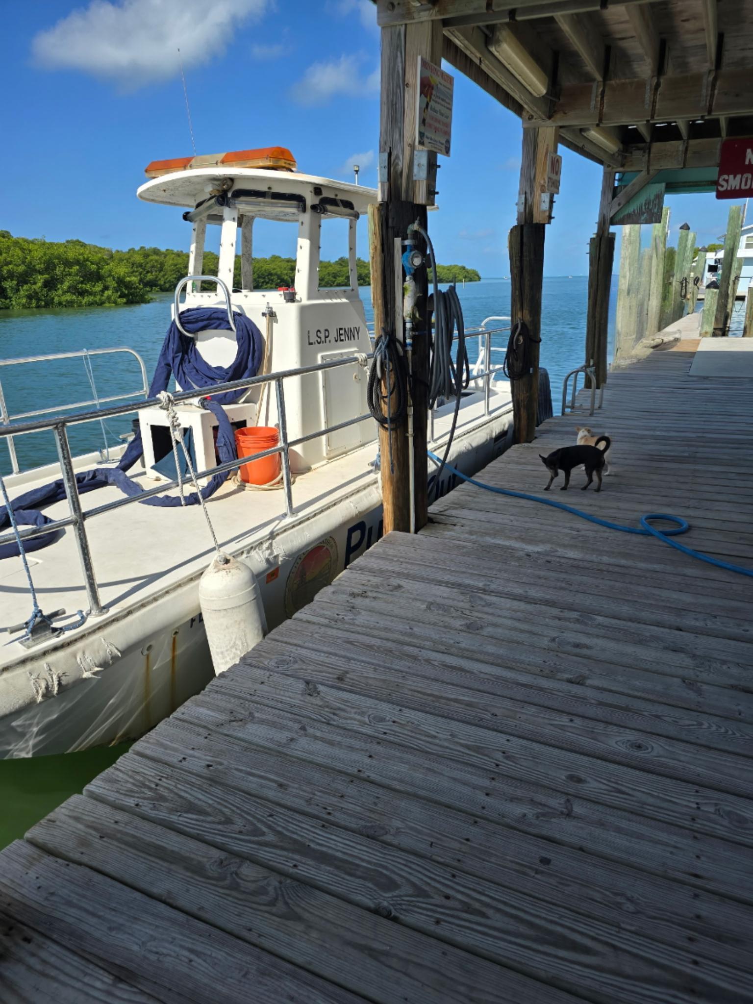 A boat fueling at Burdine's Waterfront Marina